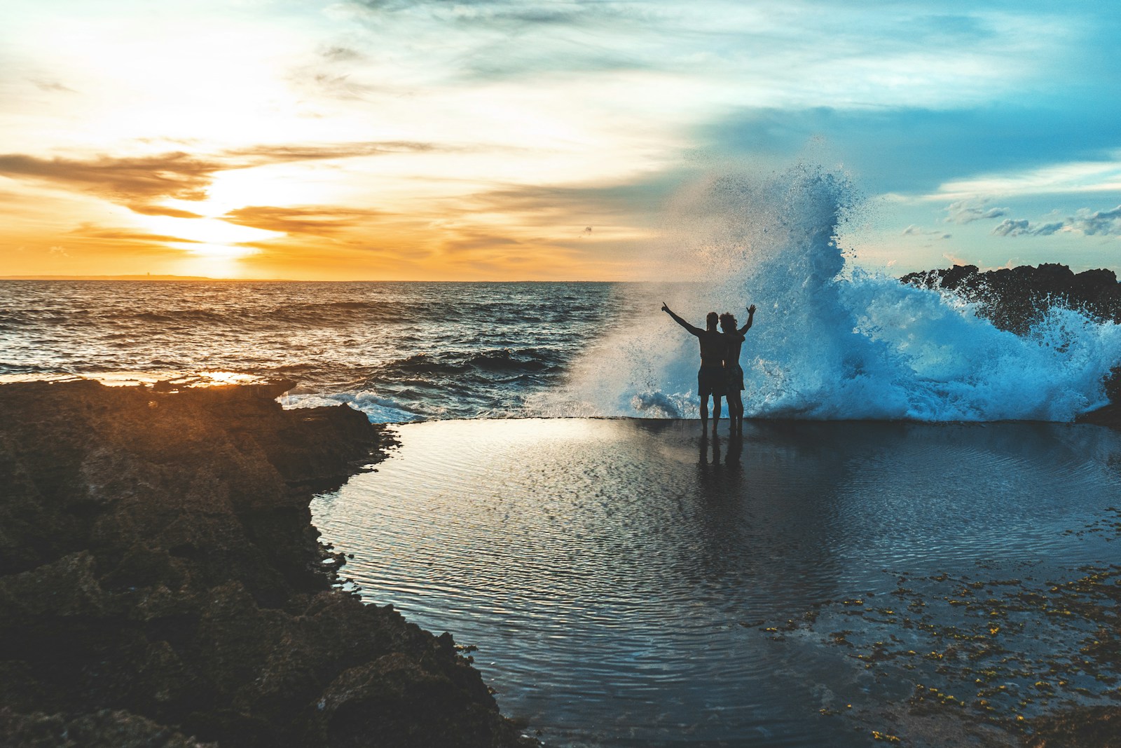 Ocean pool and waves at sunset