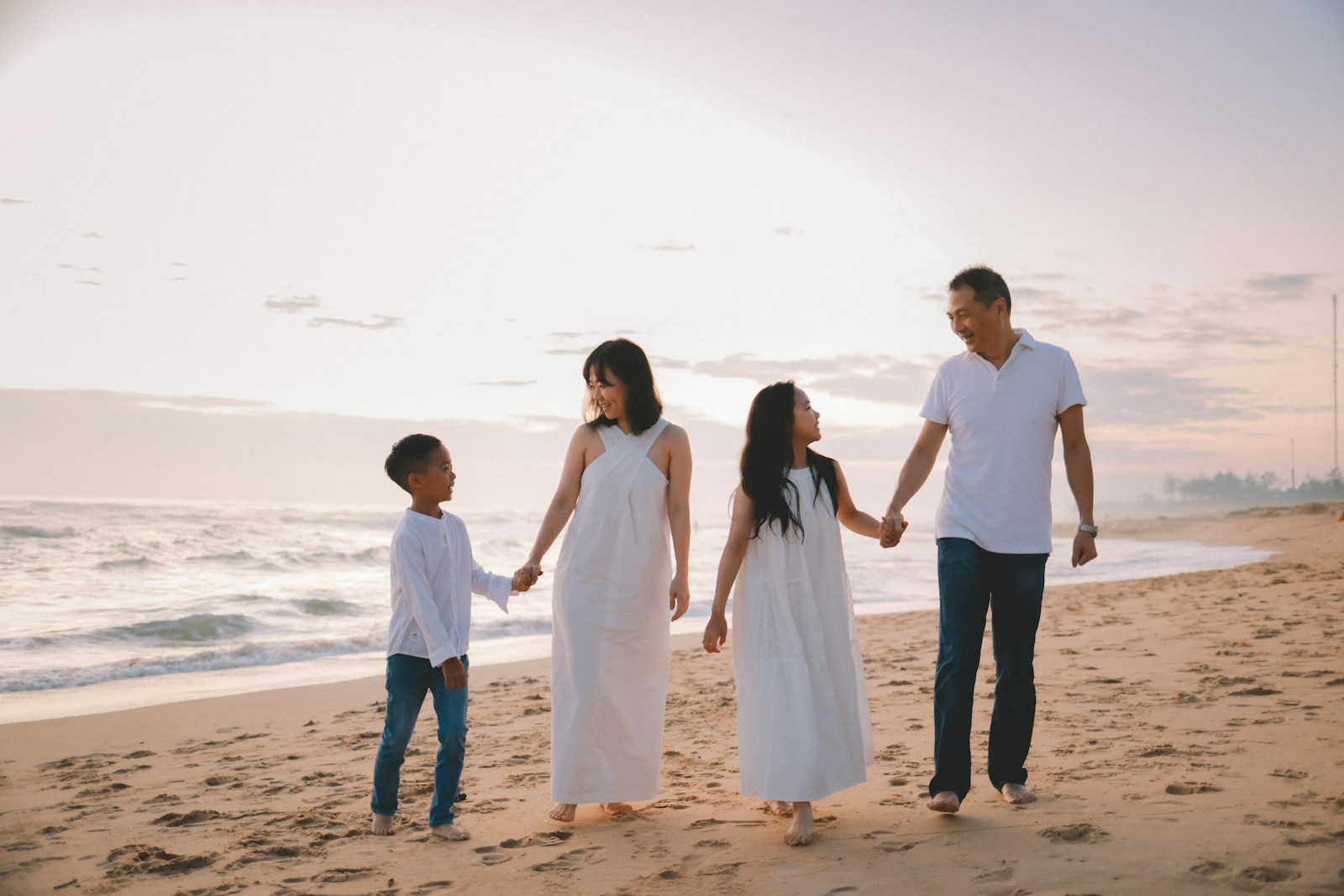 Family walking together on a beach